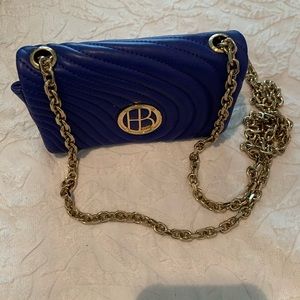 Excelent condition, Small, wallet don’t fit, but great for night out.